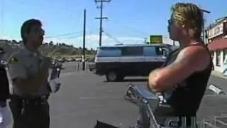 Cop pulls over Hell's Angel's  Biker