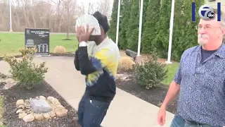 Kodak Black walking out of JAIL Covering his face with a FAN of MONEY!!