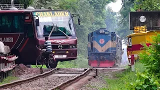 Train passing through a busy Rail Crossing/ Gate- Benapole Commuter of Bangladesh Railway