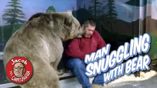 Man Snuggling with Bear