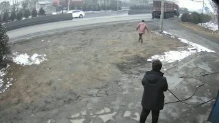 Brave bystander saves elderly woman in way of reversing truck