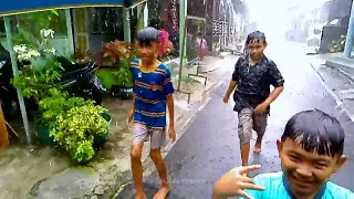 They Enjoy Playing Under Heavy Rain