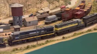 5 SEABOARD COASTLINE LOCOMOTIVES PULLING NEARLY 100 CARS OF MIXED FREIGHT ON THE EASTBOUND MAINLINE