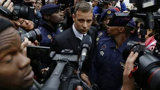 South African athlete Oscar Pistorius is freed on parole after serving 9 years in prison