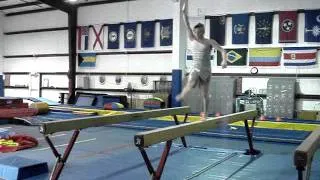 Boy doing Balance Beam FAIL