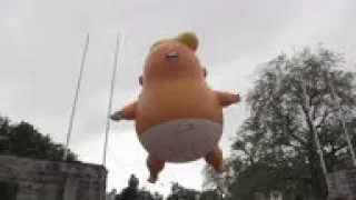 Trump blimp flies over protest march in Dublin