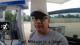 How do 4.88 axle gears and 35" tires affect fuel economy in a Jeep Wrangler?