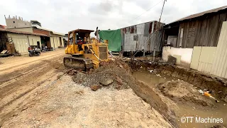 Heavy Working Project Village Road Building Foundation By Bulldozer Pushing Rock & Sand Into Water