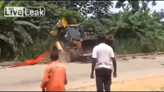 Righting A Flipped Over Back Hoe Fail