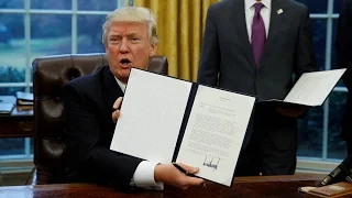 Trump signs order to pull out of TPP