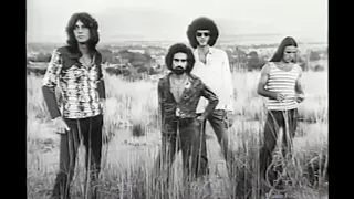 Grand Funk Railroad Behind The Music & Where are they now with advertisements.