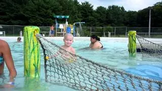 3yo William going down the tongue slide at the local pool