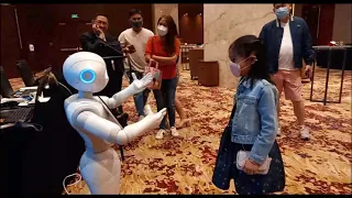Pepper (Humanoid Robot) dance Tala & Macarena with kid