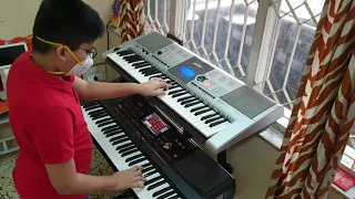 "Yaad aa raha hai tera pyar" on two keyboards by ten years old Samrat Sancheti from Nagpur