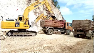 Komatsu and Caterpillar excavators work their way through the limestone mountains#roadconstruction