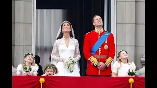 The Duke and Duchess of Cambridge watch the fly past with their families