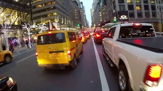 NYC Cycling 5th Avenue from 59th Street to Washington Square Park during the Holidays 2017 (Raw)