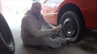 How To Put A Spare Tire On Your Car EASILY (Change A Flat Tire)