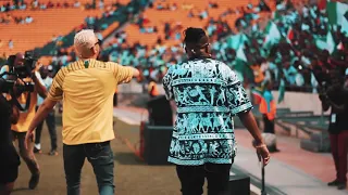 Kiddominant and AKA perform fela in versace at the FNB Stadium.