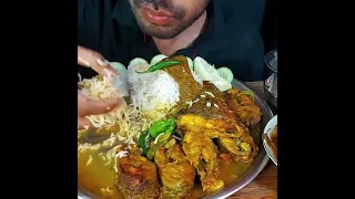 fishcurry eating with rice