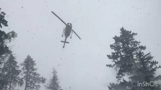 Flying a helicopter in a blizzard ￼| landing on a mountain side in near whiteout conditions