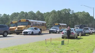 Parents react to false firearm report prompting lockdown at First Coast High School