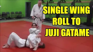 SINGLE WING ROLL TO JUJI GATAME