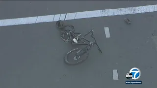 Video shows car strike bicyclist at OC intersection before alleged assault