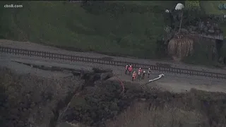 Cliff erosion along tracks in Del Mar