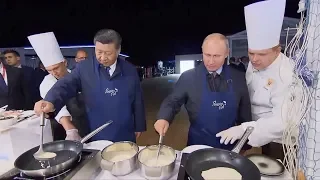 Xi and Putin make pancakes on sidelines of Eastern Economic Forum