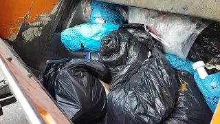 Bags and Bulky Waste crushing in Garbage Truck (Full HD)