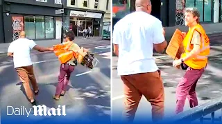 'I'm telling you one last time!': Furious man removes JSO protesters from road