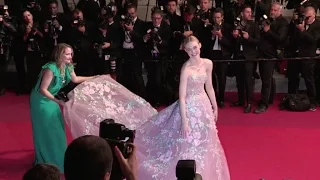 Elle Fanning looks adorable on the red carpet of The Neon Demon at the Cannes Film Festival 2016
