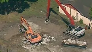 Action Air 1: Dirt now fills the sinkhole on a Seffner lot where a home once stood