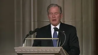 Former President George W. Bush honors father in emotional tribute