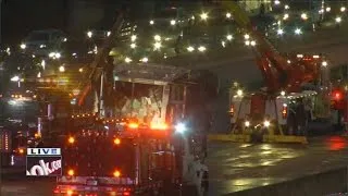 Semi truck flips on  I-25 NB