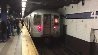 R68 D train leaving 42 Street-Port Authority Bus Terminal