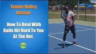 Tennis Volley Lesson: How To Deal With Balls Hit Hard To You At The Net.