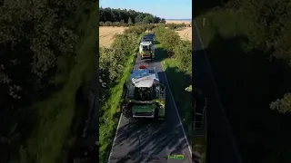 CLAAS combines on their way to the next field