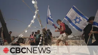 Israeli protesters disrupt flow of aid trucks at key border crossing
