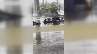 People trapped in cars during flash flooding in Arlington