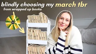 blindly choosing my march tbr with a random number generator 📚💕 *wrapped up books*