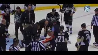 Pascal  Dupuis takes a shot to the head, would be taken off on a stretcher