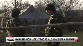 Ukraine posts troops along Crimea border
