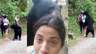 Hiker women take selfie with wild black bear in Mexico’s Chipinque Ecological Park