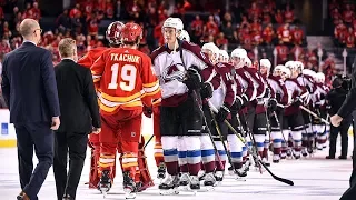 Avalanche and Flames meet at center ice to shake hands after series