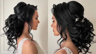 Curly low bun wedding hairstyle