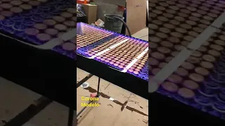 Epoxy beer pong table using corona and modelo bottle caps and led strip