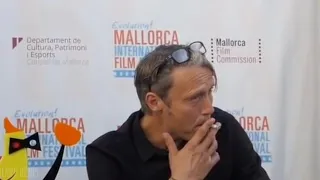 Mads Mikkelsen smoking