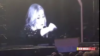 Adele Calling out Fan for Recording Concert on Cell Phone